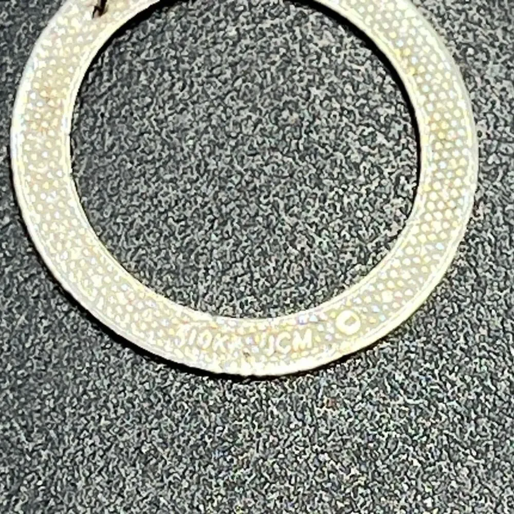 JCM 10k White Gold Round Open Circle Diamond‎ Cut Pendant Stamped